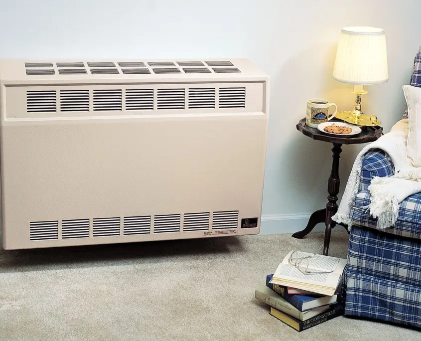 EMP DV2535 Empire heater installed in wall near chair