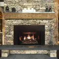 White Mountain Hearth Rushmore Insert installed in stone fireplace