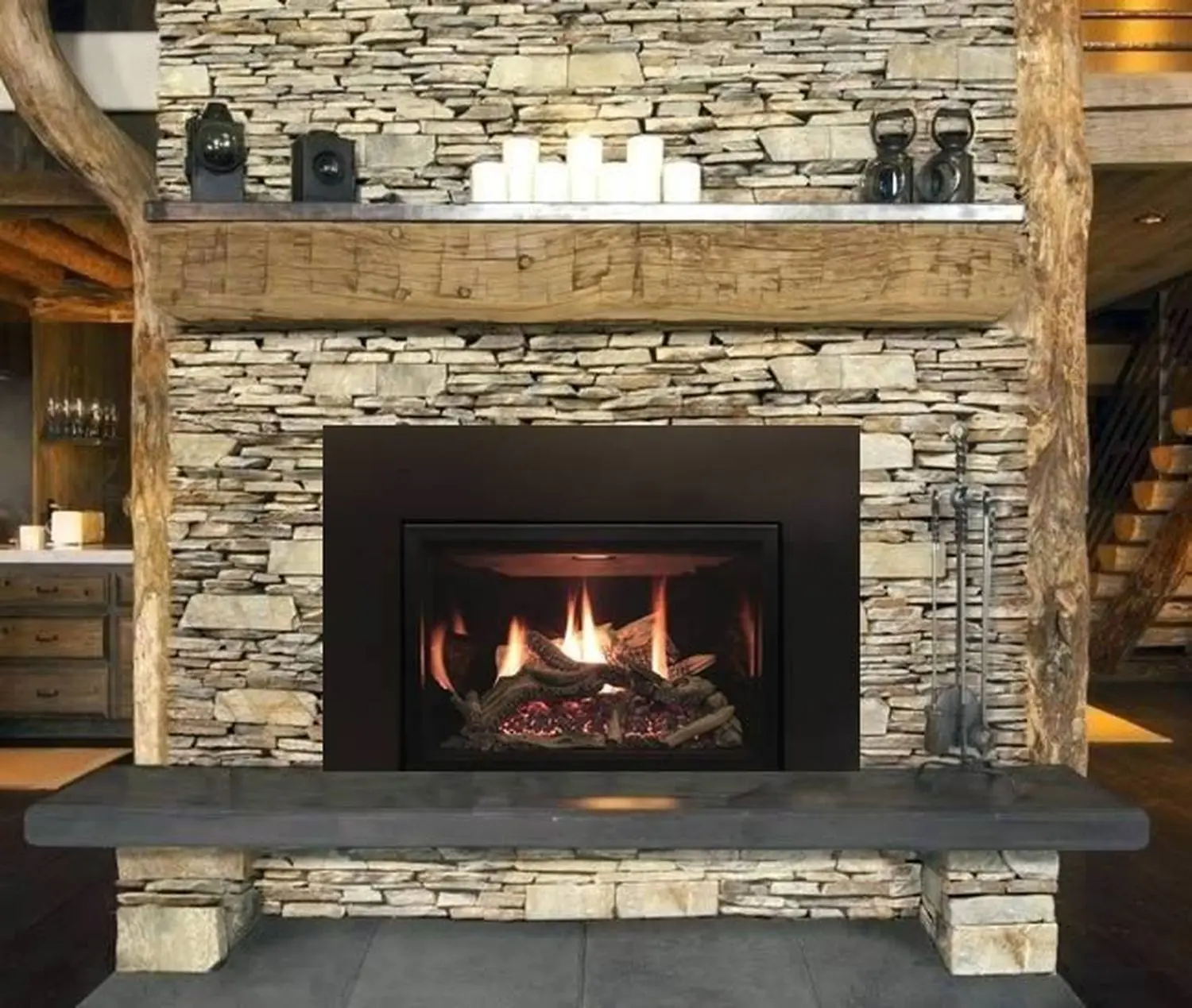 White Mountain Hearth Rushmore Insert installed in stone fireplace