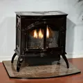White Mountain Heart Cast Iron Stove close-up on platform