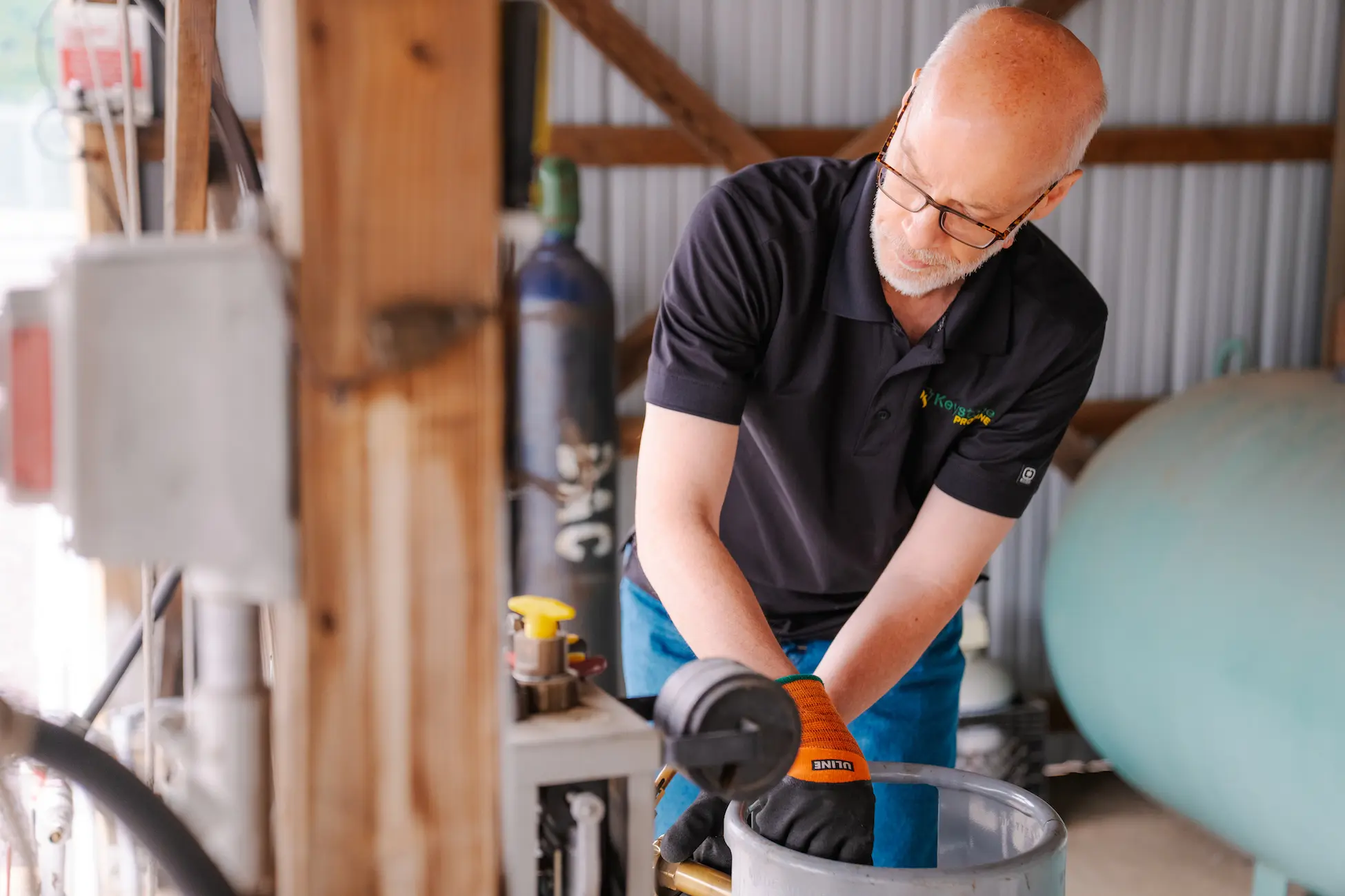 Keystone-176 Employee filling propane cylinder