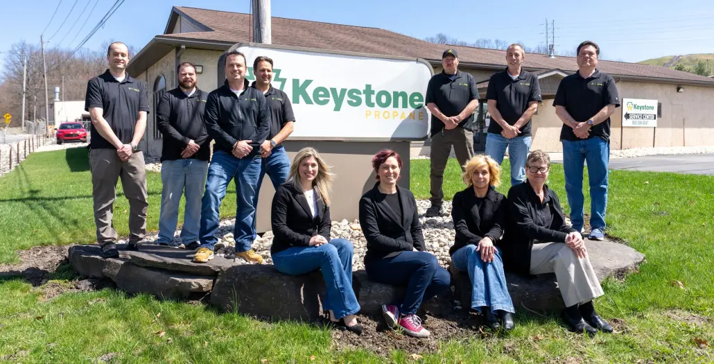 Group-Sign Group shot standing next to Keystone Propane Sign