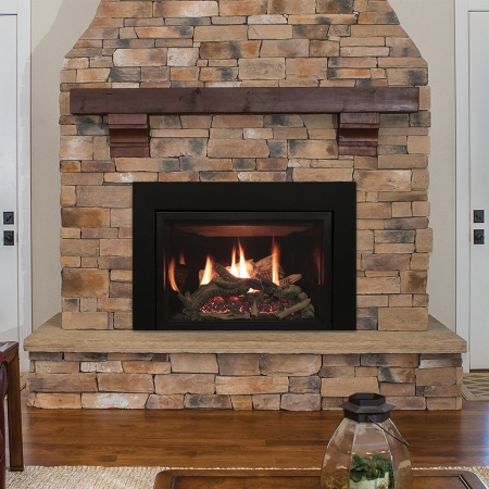 White Mountain Hearth Rushmore Insert installed in tan-brick fireplace