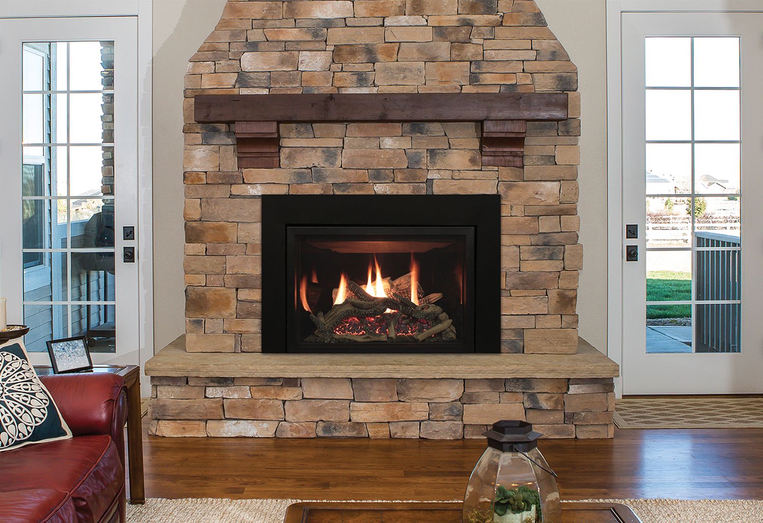 White Mountain Hearth Rushmore Insert installed in tan-brick fireplace