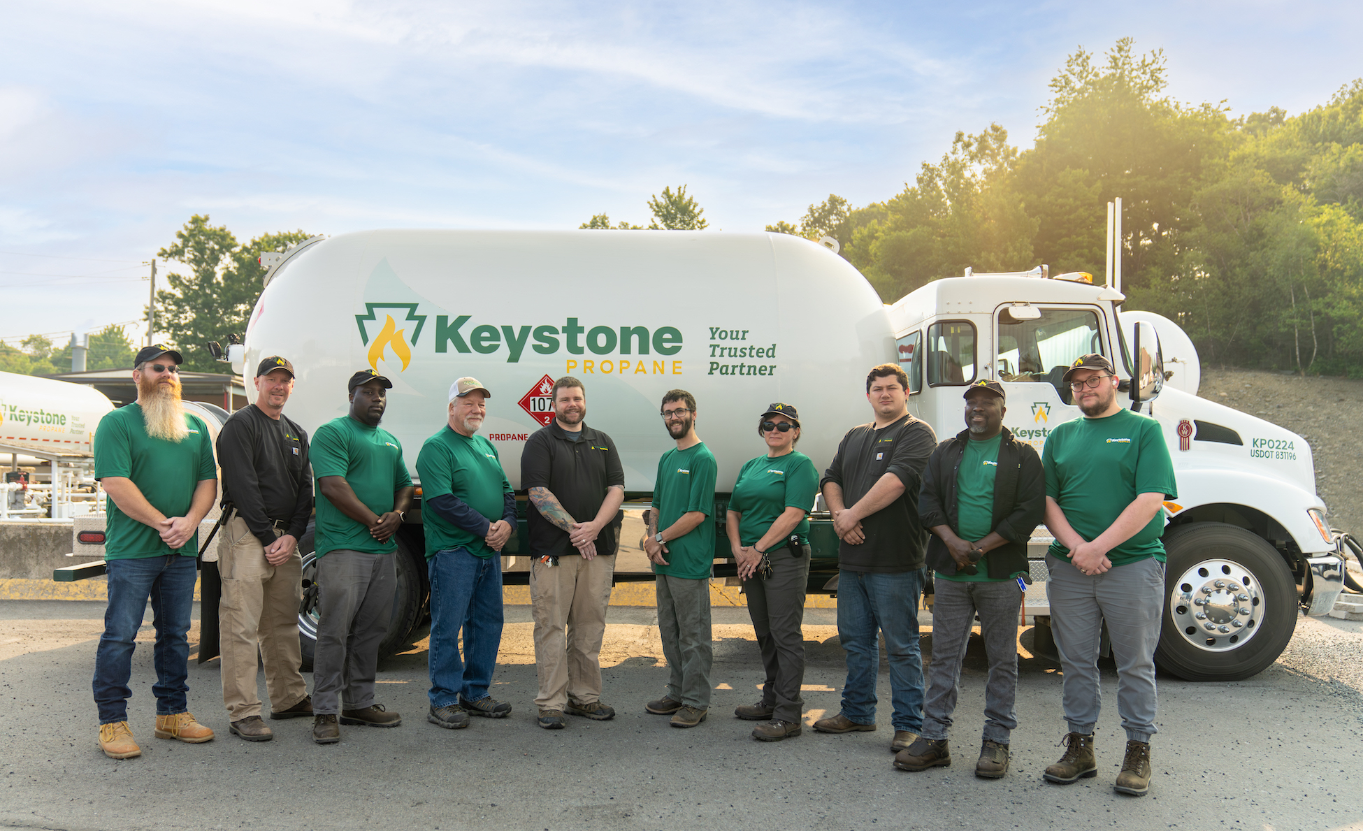 Group shot of Keystone Propane employees in from of delivery truck