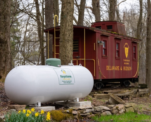 Propane Tank next to mini train car