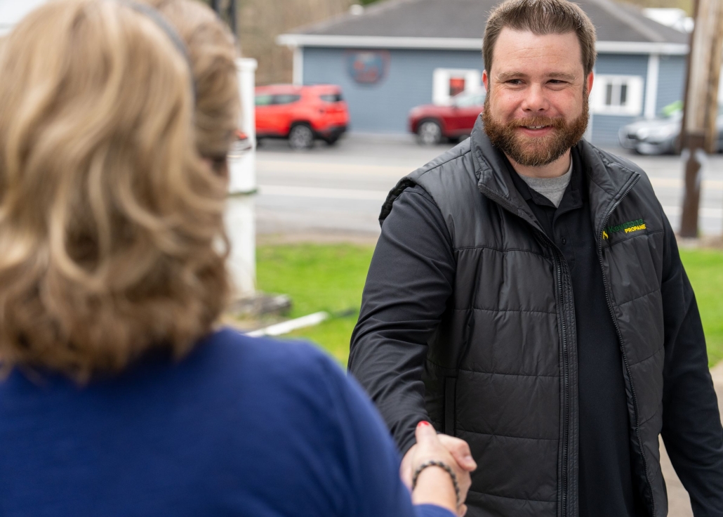 Keystone employee shaking hands with customer