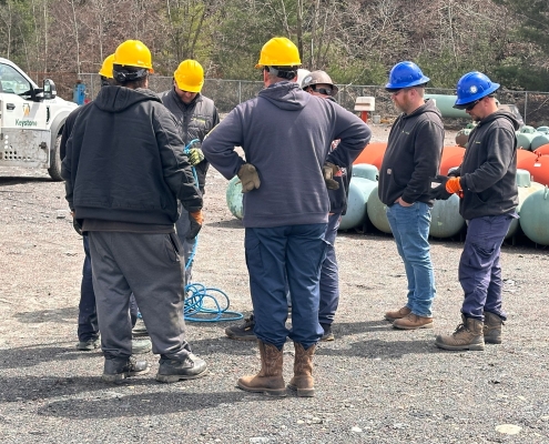 Group shot of employees in crane training