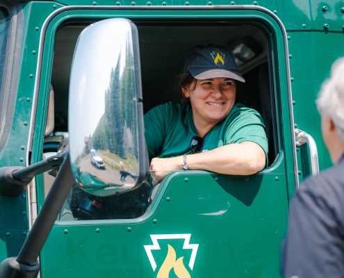 Close-up of employee in bobtail smiling