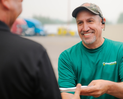 Employee shaking hands with customer