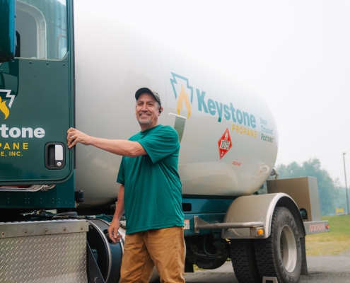 Employee getting into delivery truck