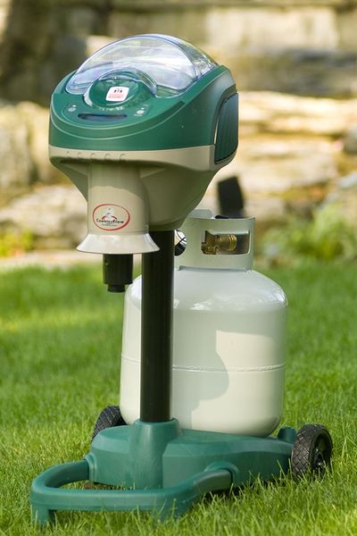 Propane mosquito trap in backyard