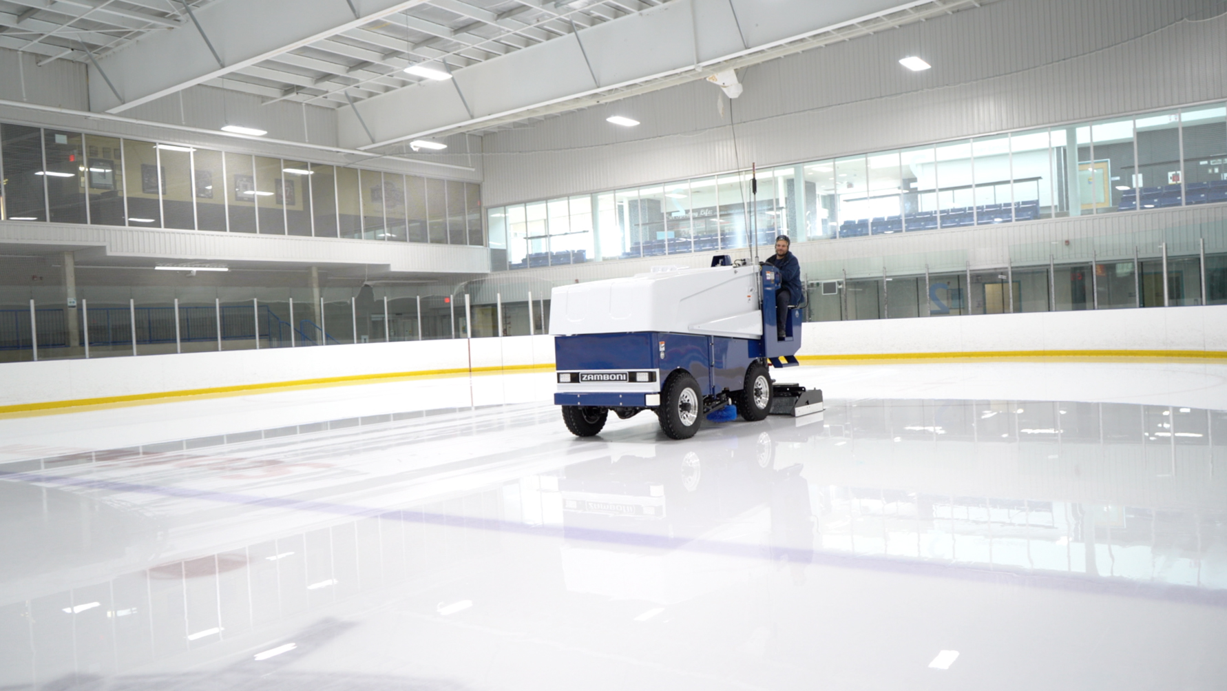 Zamboni on ice in rink